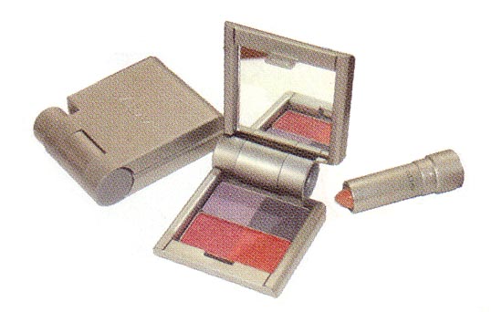 A re-fillable compact made of recycled metal.